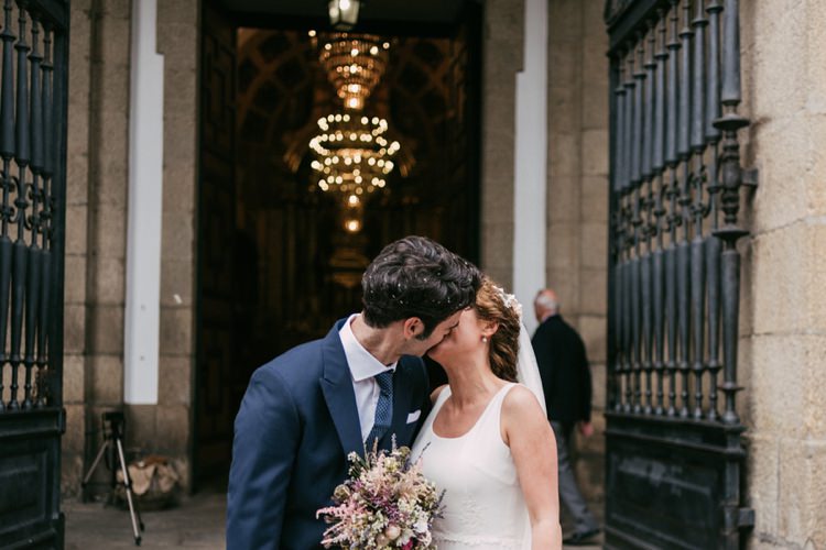 Bride Round Neck Crepe Tulle Bridal Gown Pastel Bouquet Roses Lavender Pink Cream Purple Floral Hairpiece Veil Groom Navy Blue Suit Polka Dot Tie Kiss Romantic Bohemian Spain Wedding http://saralobla.com/