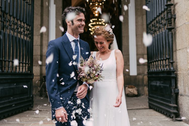 Bride Round Neck Crepe Tulle Bridal Gown Pastel Bouquet Roses Lavender Pink Cream Purple Floral Hairpiece Veil Groom Navy Blue Suit Polka Dot Tie Petals Smiles Romantic Bohemian Spain Wedding http://saralobla.com/