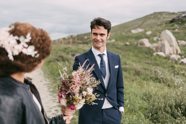 Bride Floral Hairpiece Leather Jacket Pastel Bouquet Roses Lavender Cream Pink Purple Groom Navy Blue Suit Grey Vest Polka Dot Tie Green Hills Romantic Bohemian Spain Wedding http://saralobla.com/
