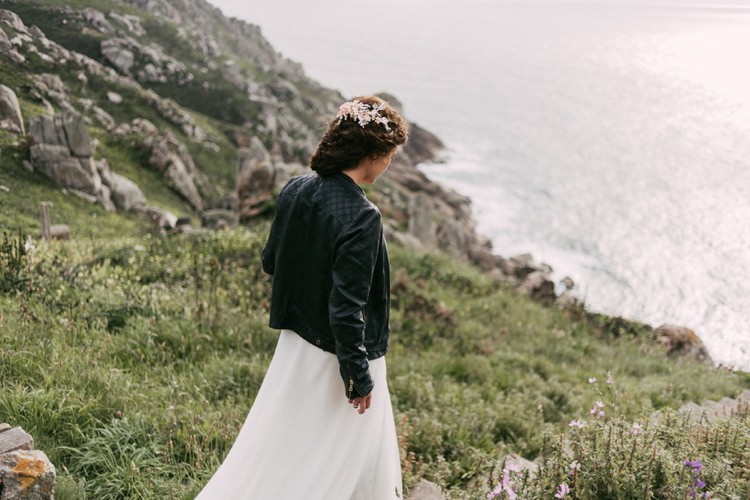 Bride Round Neck Crepe Tulle Bridal Gown Leather Jacket Floral Hairpiece Green Hills Ocean Romantic Bohemian Spain Wedding http://saralobla.com/