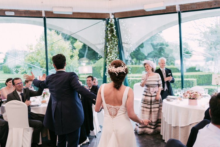 Reception Entrance Bride Round Neck Low Back Crepe Tulle Bridal Gown Groom Navy Blue Suit Guests Fairy Lights Romantic Bohemian Spain Wedding http://saralobla.com/