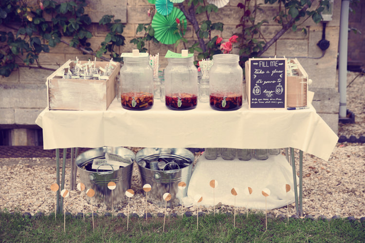 Bar Station Drink Dispensers Homespun Mint Yurt Wedding http://www.jessicaraphaelphotography.com/