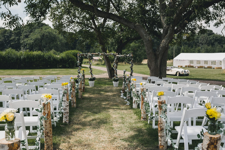 Outdoor Cerermony Suffolk Flowers Log Pastel Pretty Summer Picnic Wedding http://www.loveluella.co.uk/