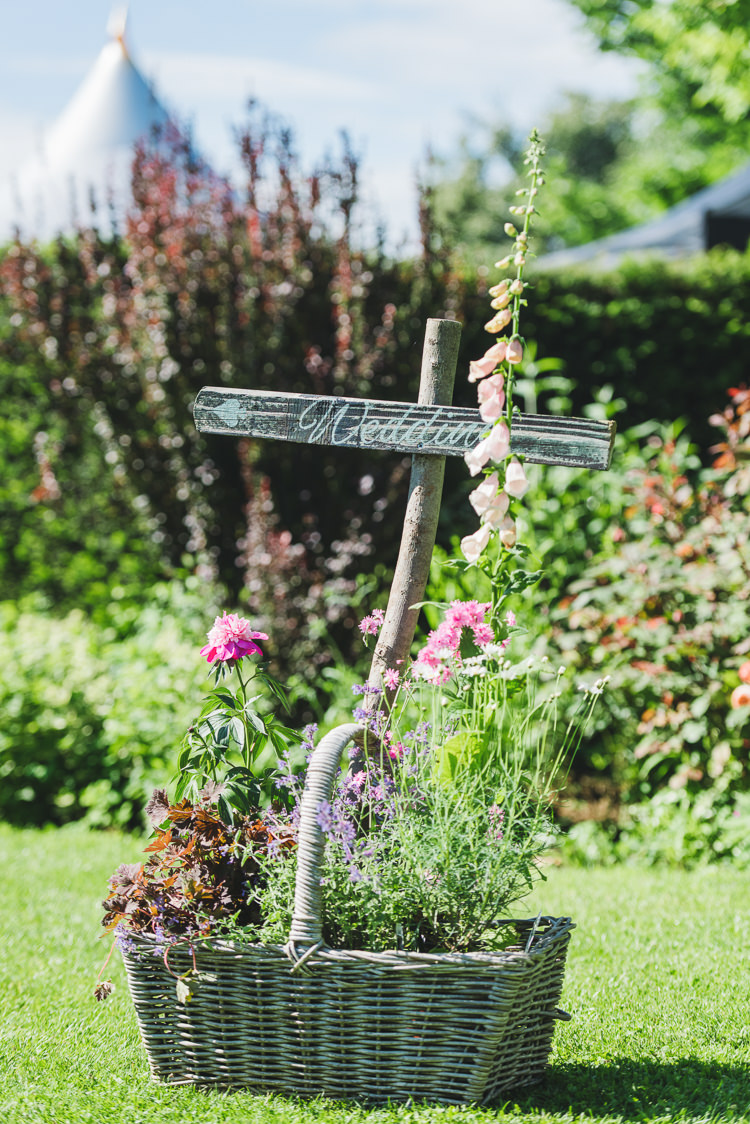 Wooden Rustic Sign Post Basket Flowers Pretty Pink Floral Garden Wedding https://www.georgimabee.com/