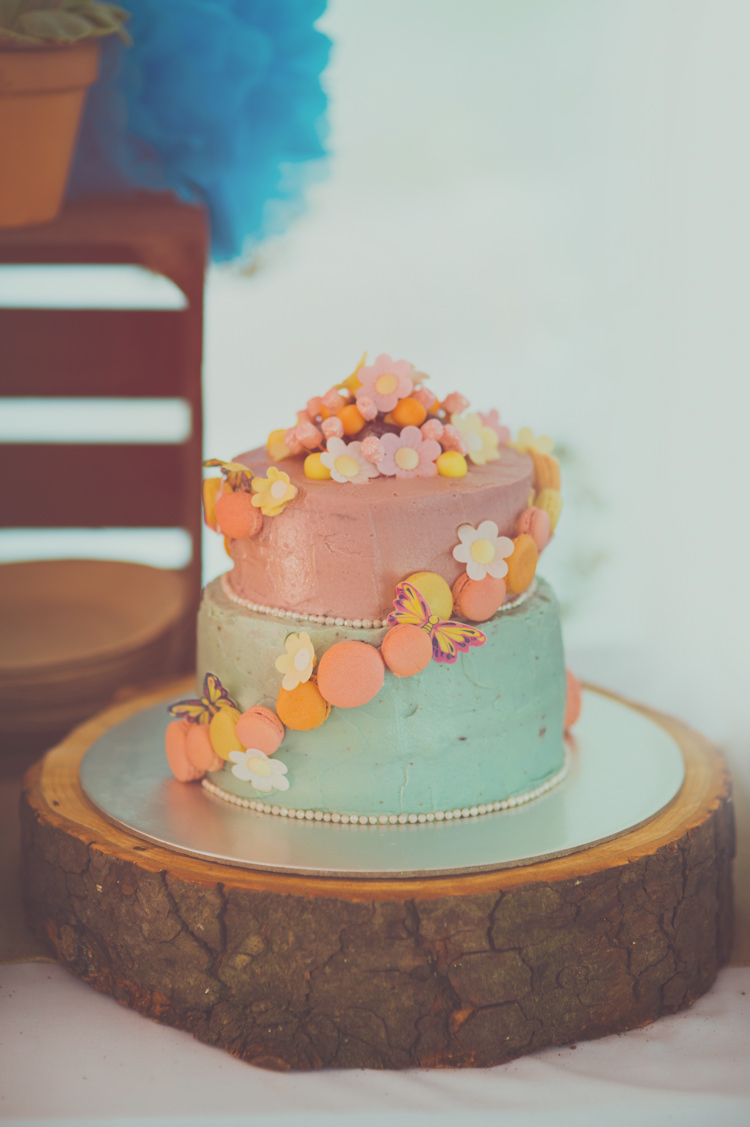 Buttercream Pastel Macaron Cake Log Colourful Woodland Humanist Wedding http://sashaweddings.co.uk/