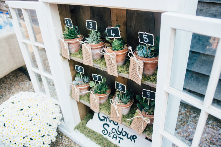 Window Potted Succulent Table Seating Plan Chart Home Made Rustic Barn Wedding http://www.sarahfleetphotography.com/