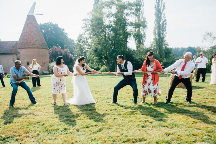Tug Of War Game Home Made Rustic Barn Wedding http://www.sarahfleetphotography.com/