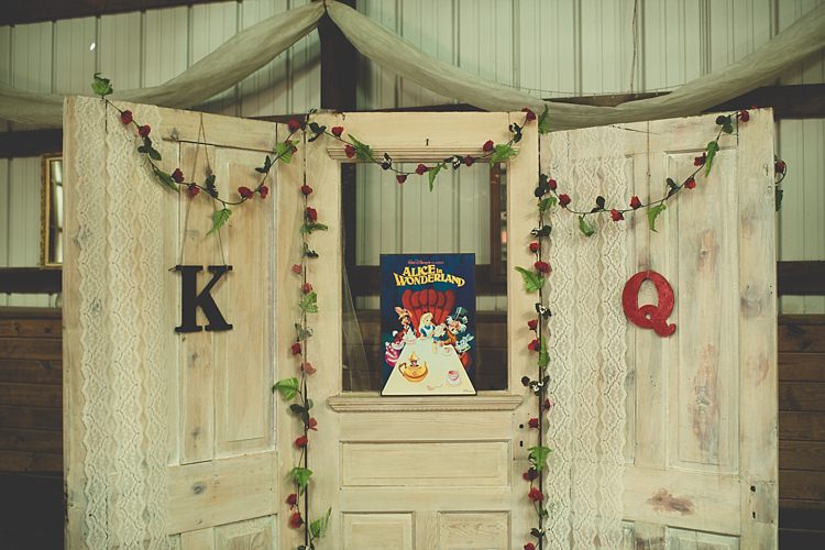 Reception Décor Wooden Door Frame Lace Floral Vines Book Alice in Wonderland Wedding Pennsylvania http://www.julieflorophotography.com/