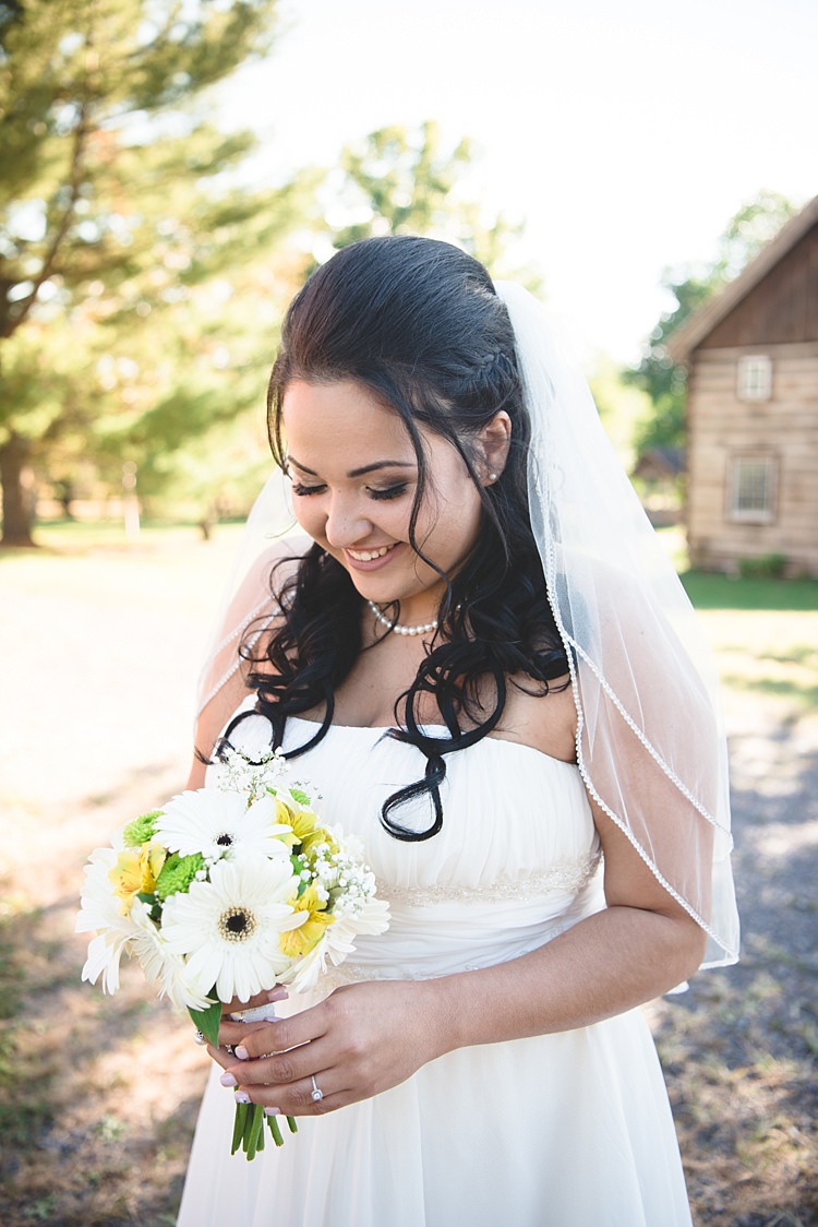 Bride Strapless Gown With Train Veil Soft Curls Hairstyle Pearl Necklace Bouquet White Yellow Gerbera Smiles Alice in Wonderland Wedding Pennsylvania http://www.julieflorophotography.com/