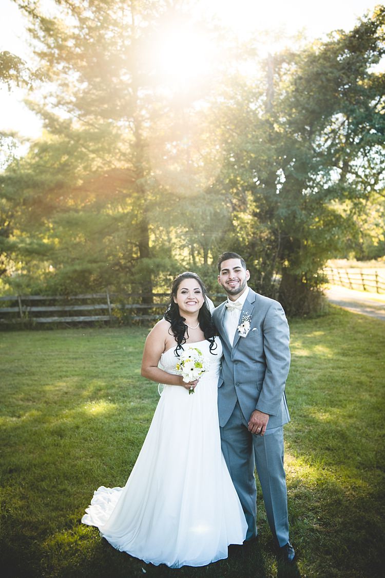Bride Strapless Gown With Train Veil Bouquet White Yellow Gerberas Groom Grey Suit White Bowtie Sunshine Trees Alice in Wonderland Wedding Pennsylvania http://www.julieflorophotography.com/