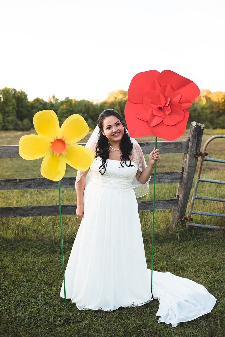 Bride Strapless Gown With Train Veil Giant Colourful Paper Flowers Trees Wooden Fence Alice in Wonderland Wedding Pennsylvania http://www.julieflorophotography.com/