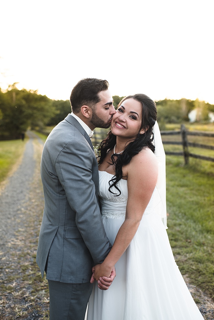Bride Strapless Gown With Train Veil Groom Grey Suit White Bowtie Gravel Road Trees Wooden Fence Alice in Wonderland Wedding Pennsylvania http://www.julieflorophotography.com/