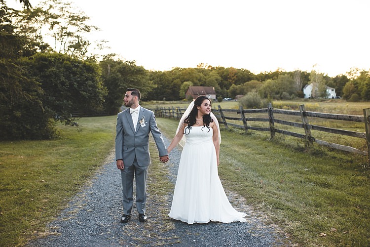 Bride Strapless Gown With Train Veil Groom Grey Suit White Bowtie Gravel Road Trees Wooden Fence Alice in Wonderland Wedding Pennsylvania http://www.julieflorophotography.com/