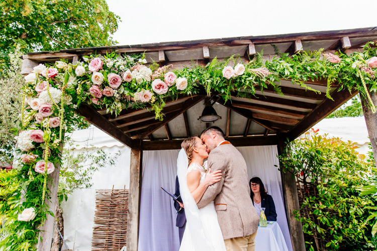 Flowers Arch Ceremony Arbour Gazebo Roses Fresh Relaxed Romantic Pink Green Pub Wedding http://www.els-photography.com/