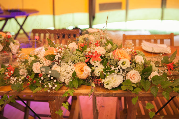 Top Table Flowers Orange Roses Rustic Outdoor Rural Tipi Wedding http://emmastonerweddings.com/
