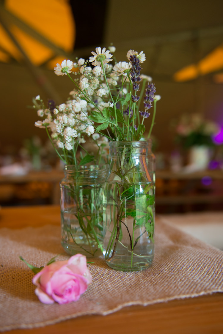 Wild Flowers Jar Bottles Rustic Outdoor Rural Tipi Wedding http://emmastonerweddings.com/