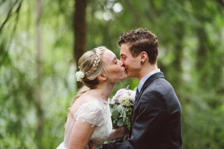 First Look Bride Cap Sleeve Backless Tulle Bridal Gown Bouquet White Purple Chrysanthemum Roses Groom Charcoal Suit Toms Shoes Kiss Magical Fairytale Forest Wedding Washington http://karissaroe.com/