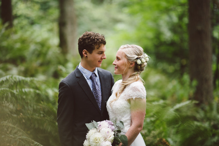 Bride Cap Sleeve Backless Tulle Bridal Gown Bouquet White Purple Chrysanthemum Roses Groom Charcoal Suit Patterned Purple Tie Greenery Trees Magical Fairytale Forest Wedding Washington http://karissaroe.com/