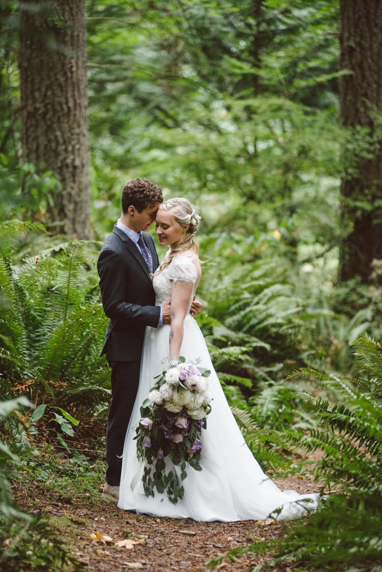 Bride Cap Sleeve Backless Tulle Bridal Gown Bouquet White Purple Chrysanthemum Roses Groom Charcoal Suit Patterned Purple Tie Toms Shoes Greenery Trees Magical Fairytale Forest Wedding Washington http://karissaroe.com/