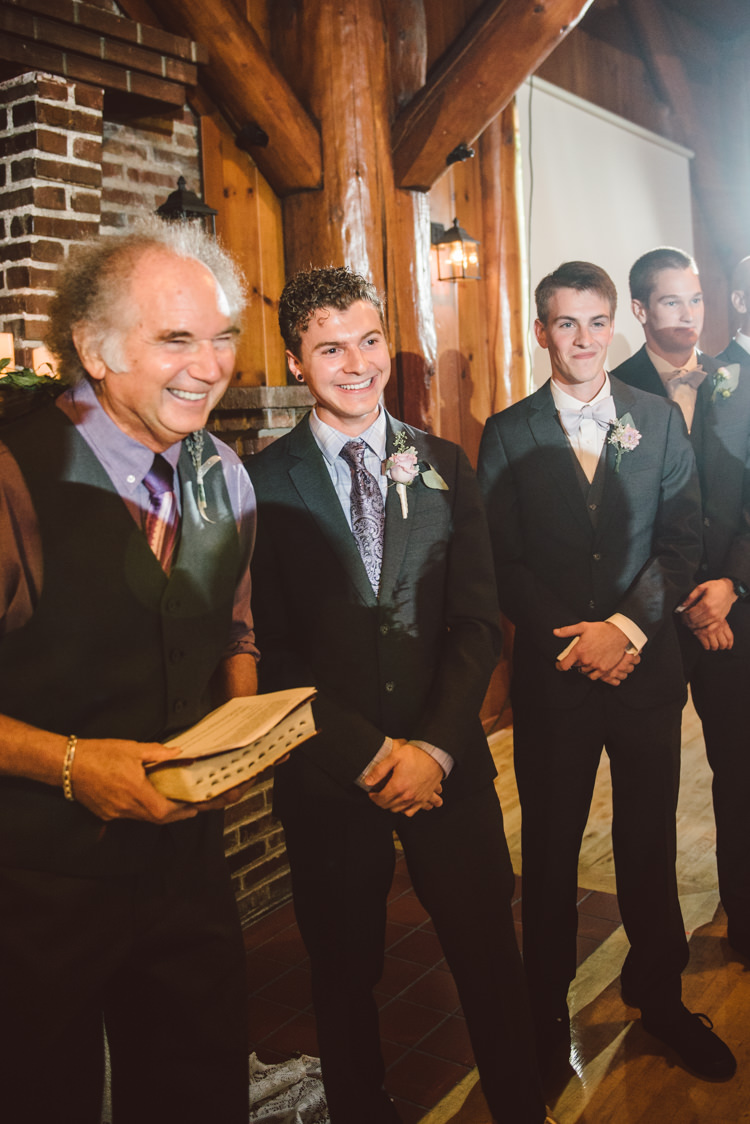 Wooden Hall Ceremony Groom Charcoal Suit Purple Patterned Tie Celebrant Groomsmen Magical Fairytale Forest Wedding Washington http://karissaroe.com/