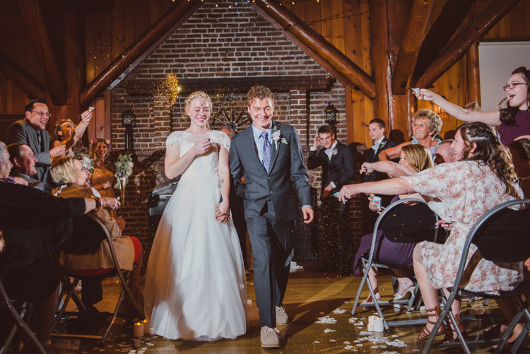 Wooden Hall Ceremony Bride Groom Glitter Exit Guests Celebration Magical Fairytale Forest Wedding Washington http://karissaroe.com/