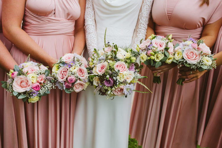 Bouquets Flowers Bride Bridal Bridesmaids Pink Purple Roses Pretty Festival Barn Countryside Wedding http://www.claretamim.co.uk/