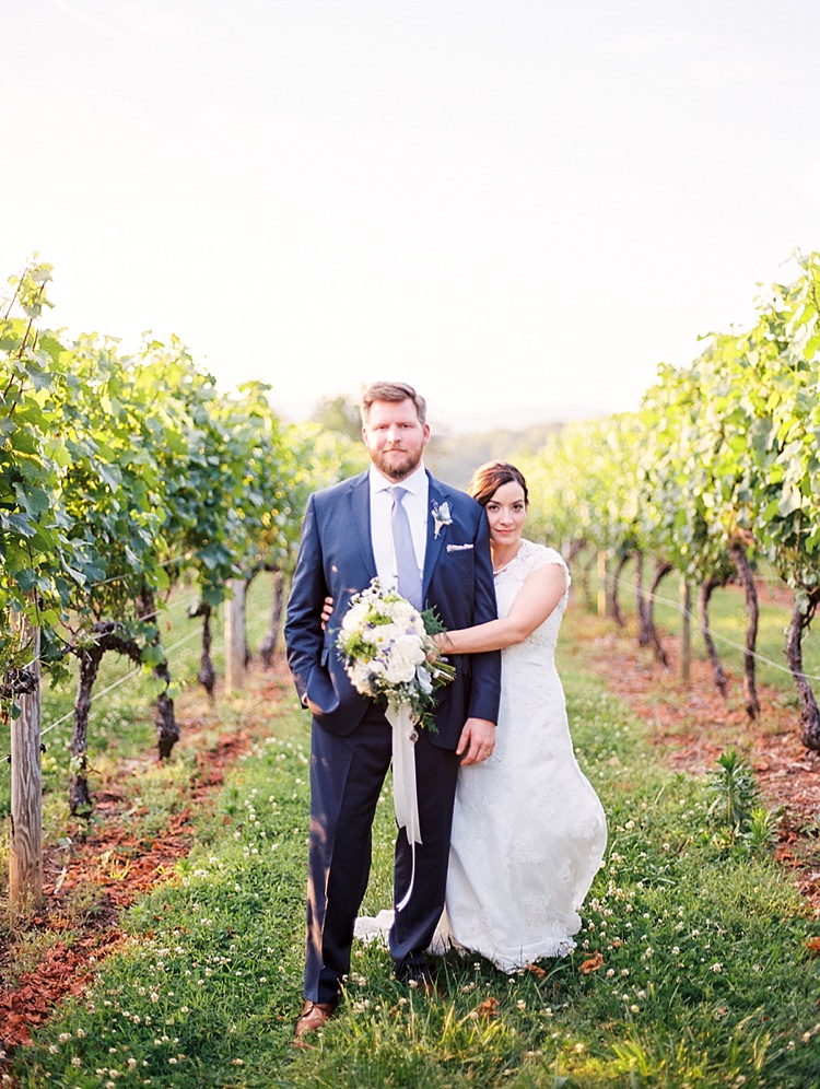 Bride Lace Cap Sleeve Bridal Gown Groom Navy Suit Purple Tie Bouquet Peonies Lavender Ribbon Sunset Vines Outdoor Spring Vineyard Wedding Tennessee http://www.juicebeatsphotography.com/