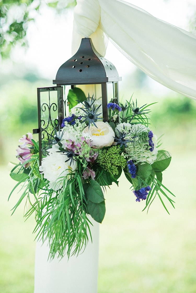 Hanging Décor White Fabric Metal Lantern Fresh Florals Peony Lavender Ranunculus Greenery Outdoor Spring Vineyard Wedding Tennessee http://www.juicebeatsphotography.com/