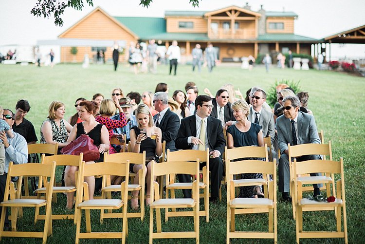 Outdoor Ceremony Wooden Chairs Guests Green Grass Outdoor Spring Vineyard Wedding Tennessee http://www.juicebeatsphotography.com/