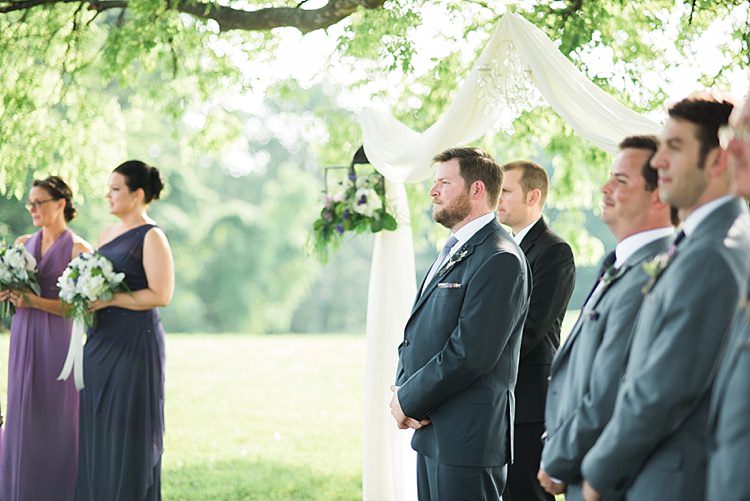 Outdoor Ceremony Groom Navy Suit Groomsmen Bridesmaids Hanging Décor Lantern Fresh Florals Outdoor Spring Vineyard Wedding Tennessee http://www.juicebeatsphotography.com/