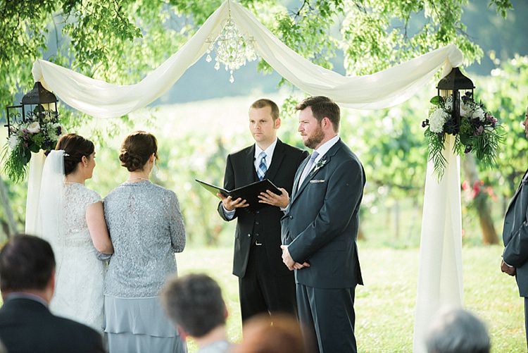 Outdoor Ceremony Bride Mother Groom Celebrant Hanging Décor Chandelier White Fabric Lanterns Fresh Florals Outdoor Spring Vineyard Wedding Tennessee http://www.juicebeatsphotography.com/