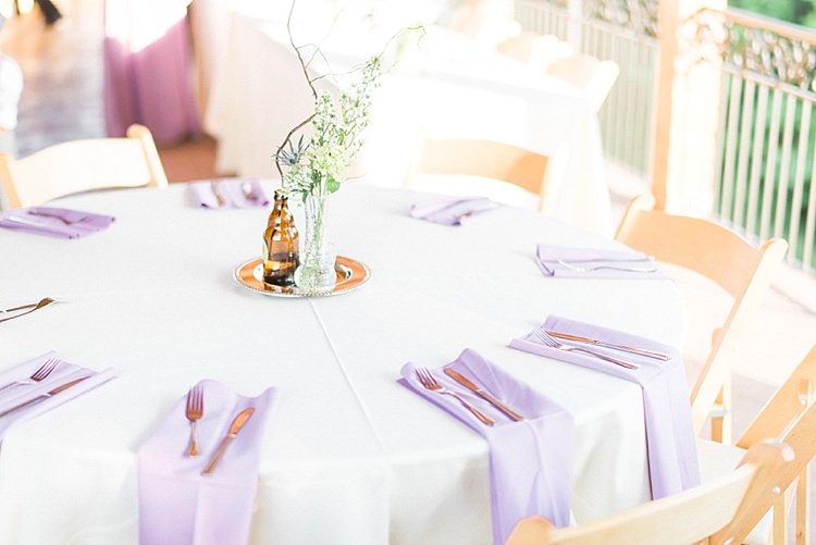 Reception Table Setting Lavender Serviettes Glass Vase Fresh Florals Brown Bottle Centrepiece Outdoor Spring Vineyard Wedding Tennessee http://www.juicebeatsphotography.com/
