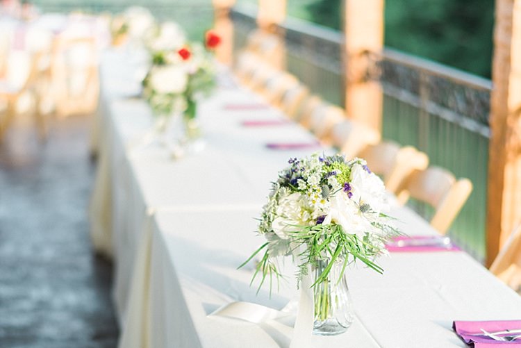 Reception Table Settings Lavender Serviettes Glass Vases Fresh Florals Ribbons Wooden Chairs Outdoor Spring Vineyard Wedding Tennessee http://www.juicebeatsphotography.com/