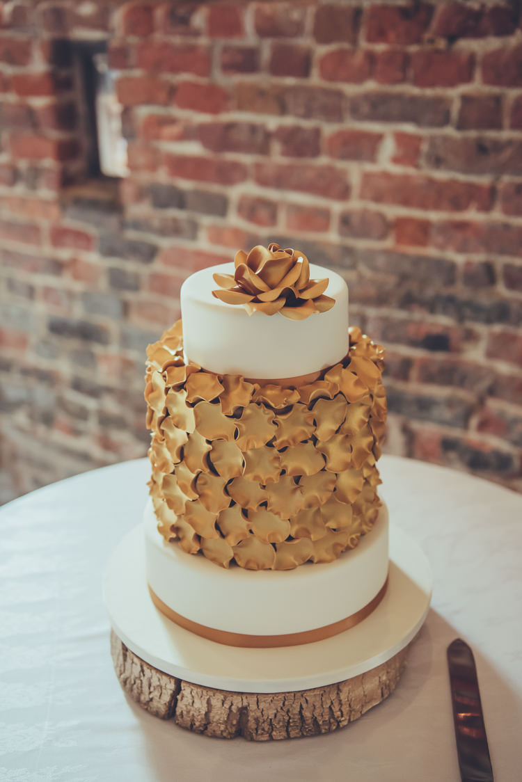 Gold Petal Cake Log Stand Bespoke Rustic Homespun Wedding http://lisahowardphotography.co.uk/