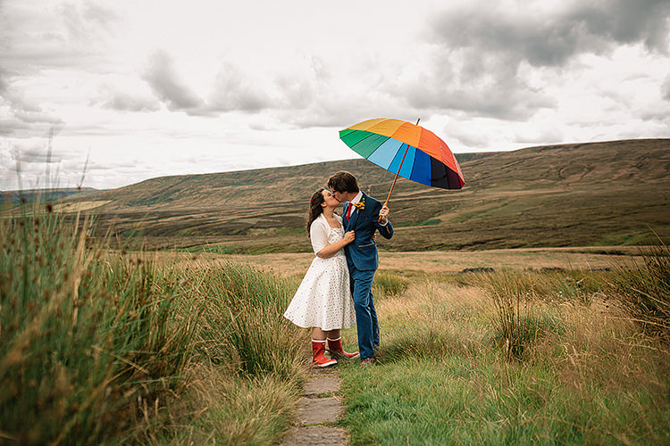 Umbrella Bride Groom Rain Fun Multicoloured Party Wedding http://www.pauljosephphotography.co.uk/