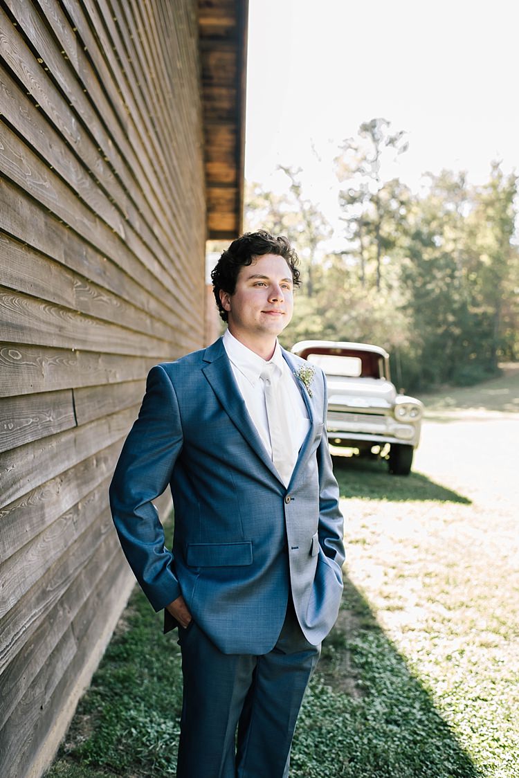Groom Navy Blue Suit Ivory Tie Vintage Car Barn Whimsical Boho Outdoor Wedding Alabama http://belightphotography.com/