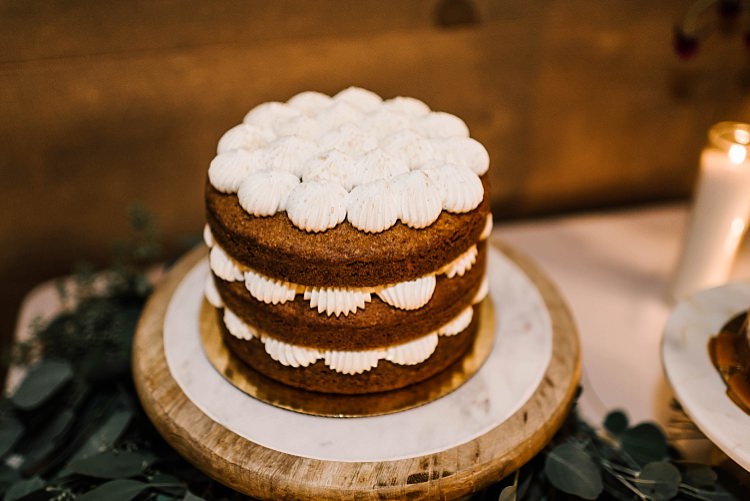 Reception Desserts Multilayered Cake Wooden Stand Fresh Eucalyptus Whimsical Boho Outdoor Wedding Alabama http://belightphotography.com/