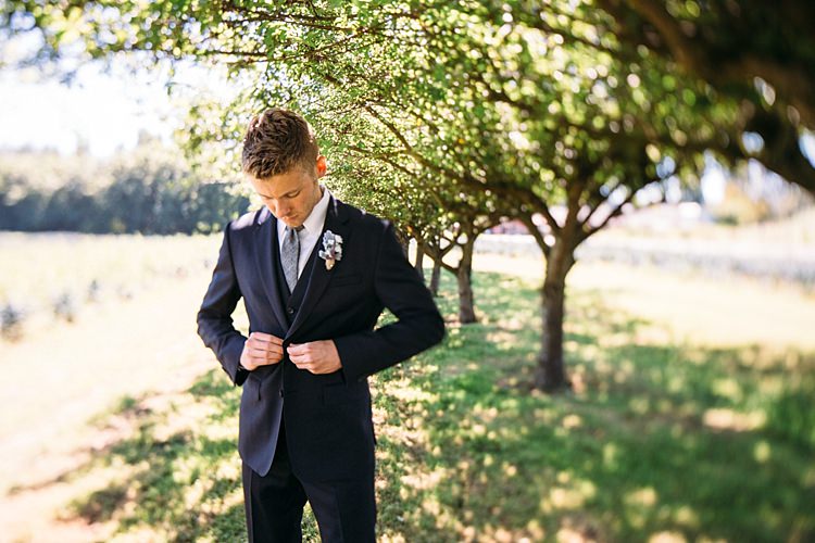 Groom Navy Blue Suit Vest Grey Tie Floral Button Hole Style Organic Farm Wedding Washington http://www.katiedayphotos.com/