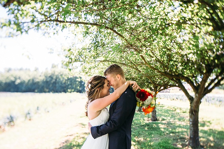 Bride Lace Tulle Bridal Gown Grey Sash Bright Orange Red Yellow Bouquet Groom Navy Blue Suit Trees Organic Farm Wedding Washington http://www.katiedayphotos.com/