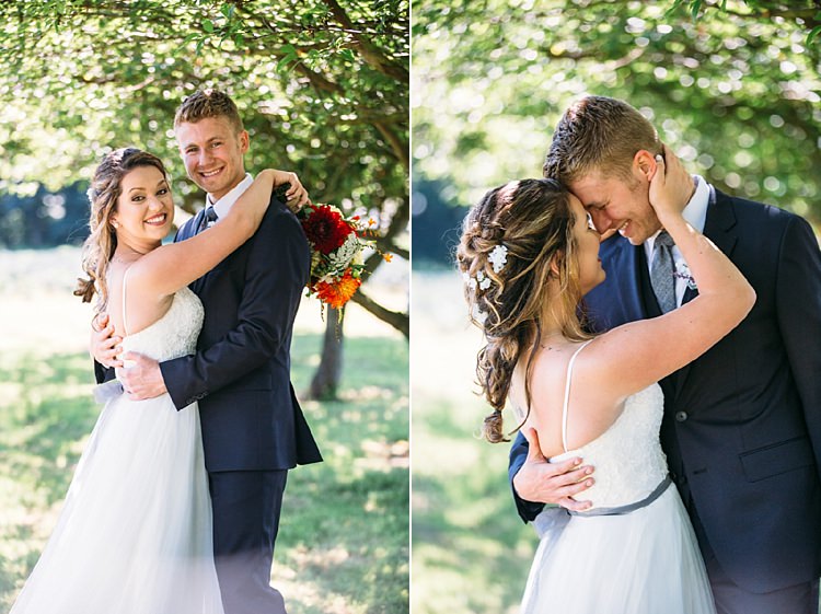 Bride Lace Tulle Bridal Gown Grey Sash Bright Orange Red Yellow Bouquet Loose Curls Hairstyle Flowers Groom Navy Blue Suit Grey Tie Trees Organic Farm Wedding Washington http://www.katiedayphotos.com/