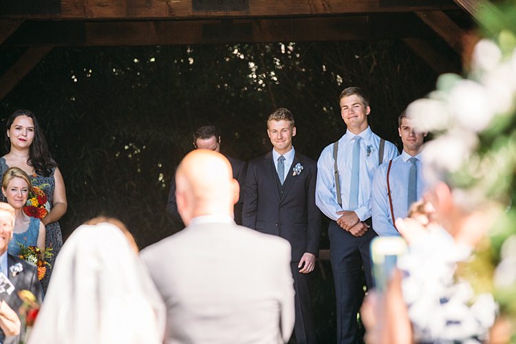 Outdoor Ceremony Bride Entrance Groom Navy Blue Suit Grey Tie Groomsmen Bridesmaids Organic Farm Wedding Washington http://www.katiedayphotos.com/