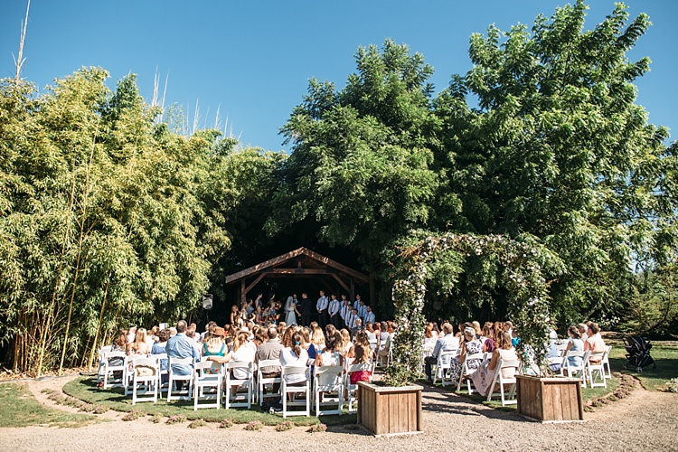 Outdoor Ceremony Floral Greenery Archway Bridal Party Guests Leafy Trees Organic Farm Wedding Washington http://www.katiedayphotos.com/