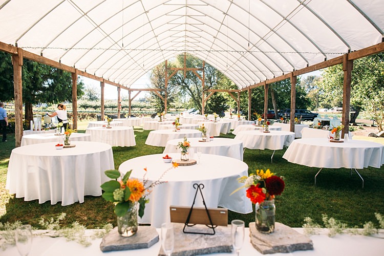 Outdoor Reception Marquee Round Tables Bright Florals Glass Vases Organic Farm Wedding Washington http://www.katiedayphotos.com/