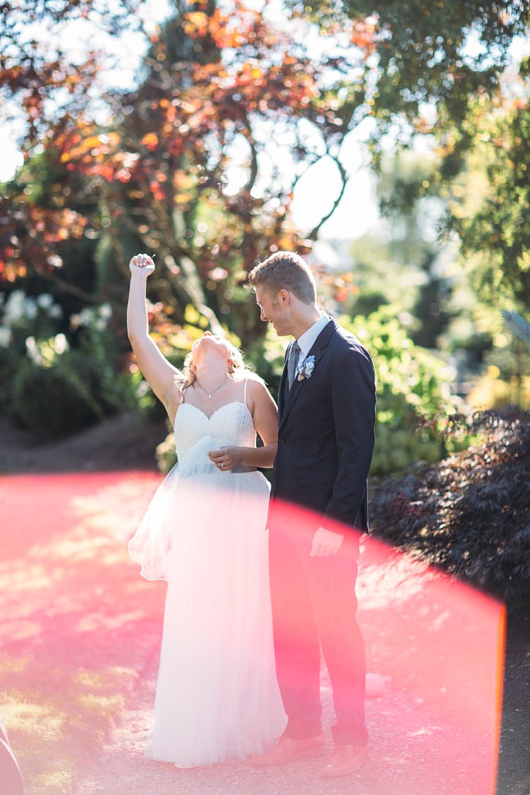 Bride Lace Tulle Bridal Gown Grey Sash Groom Navy Blue Suit Grey Tie Floral Button Hole Celebration Organic Farm Wedding Washington http://www.katiedayphotos.com/