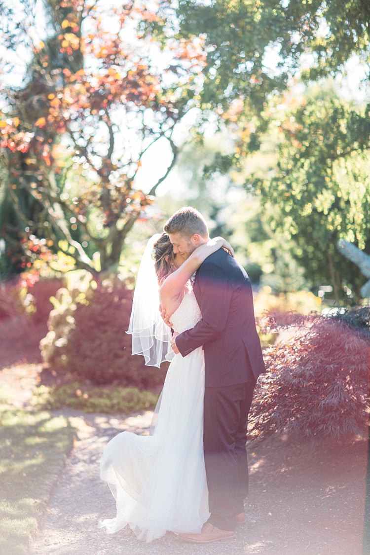Bride Lace Tulle Bridal Gown Grey Sash Groom Navy Blue Suit Grey Tie Hugs Organic Farm Wedding Washington http://www.katiedayphotos.com/