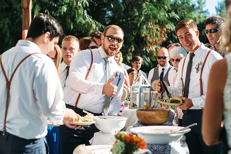 Groomsmen White Shirts Ties Suspenders Reception Food Table Thumbs Up Organic Farm Wedding Washington http://www.katiedayphotos.com/