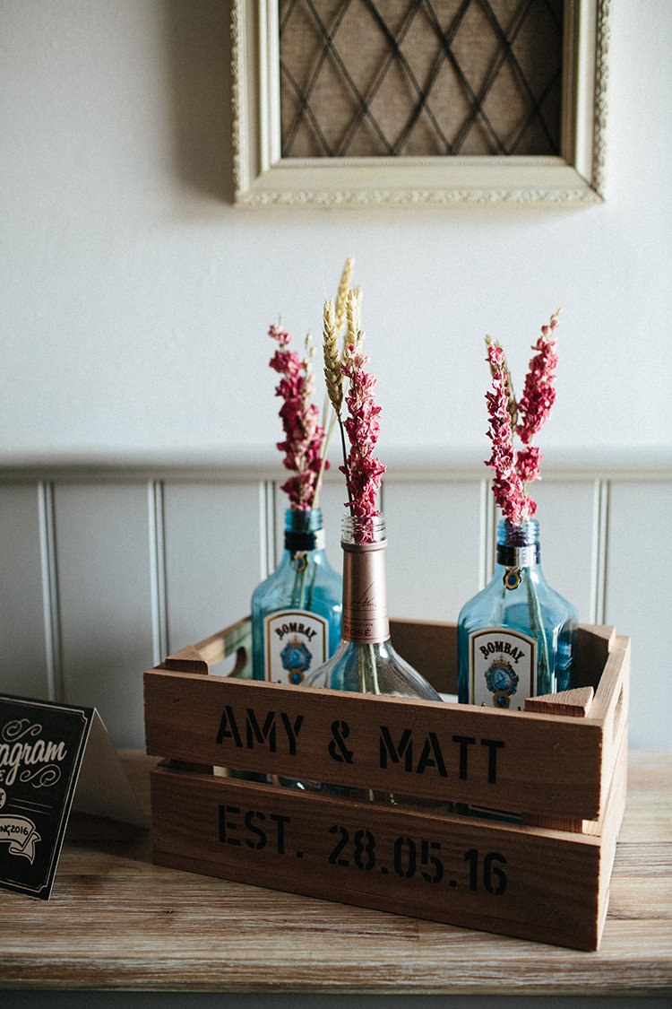 Gin Bottle Dried Flowers Wheat Crate Decor Soft Springtime Countryside Wedding http://www.claudiarosecarter.co.uk/