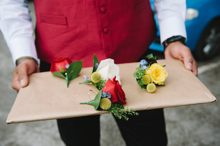 Buttonholes Roses Red Yellow Artistic Creative Colourful Farm Wedding http://www.mustardyellowphotography.com/