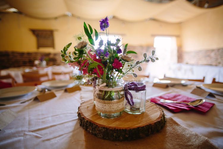 Jar Flowers Lace Hessian Log Centrepiece Mismatched Berry DIY Wedding http://www.colinianross.com/