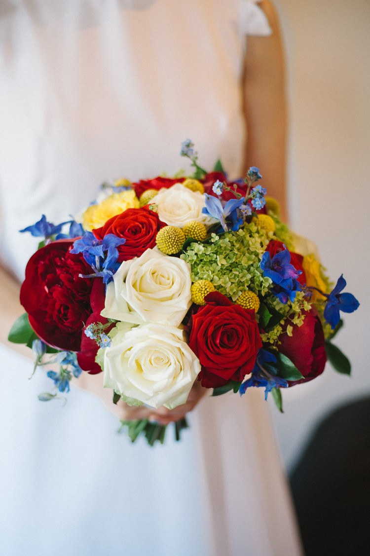 Bouquet Flowers Bride Bridal Red Yellow Blue Roses Artistic Creative Colourful Farm Wedding http://www.mustardyellowphotography.com/